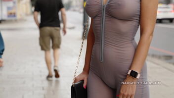 Public flashing wifey in translucent jumpsuit gets the attention of passersby.